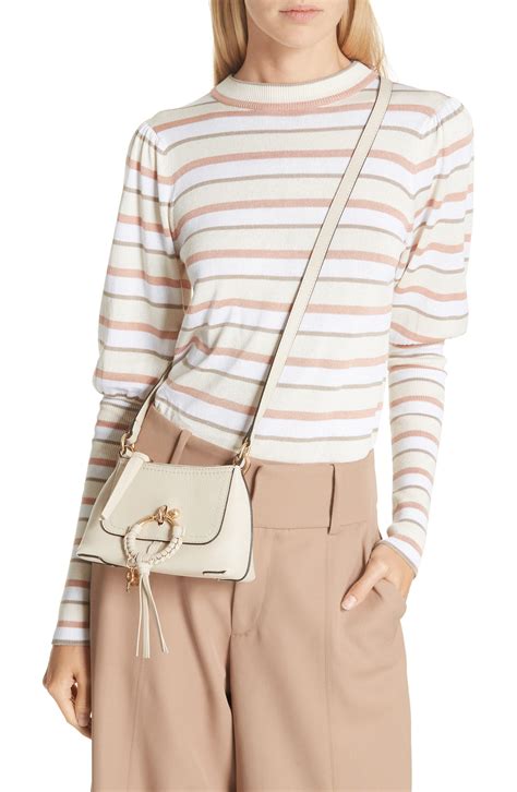 Joan mini crossbody bag .